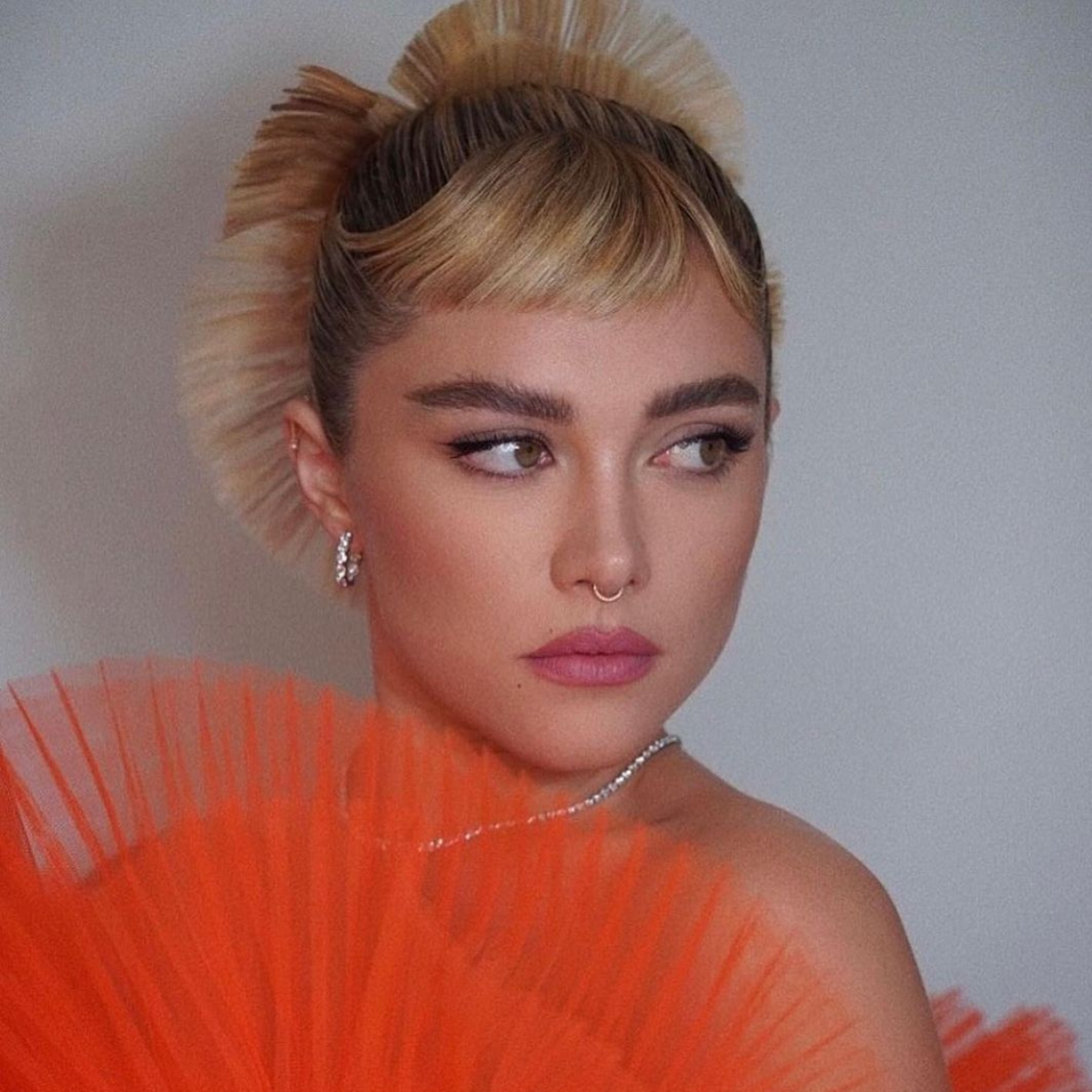 Behind the scenes image of model Florence Pugh of her makeup